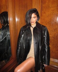 Kylie Jenner wears a beige romper as she shares 'forgotten' selfies