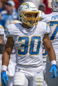 Week 17 NFL RB Injury Reports: Austin Ekeler, Christian McCaffrey, Rhamondre Stevenson, and James Conner