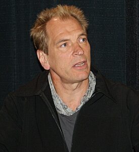 Julian Sands watches with broken heart as police answer phone calls from a missing actor