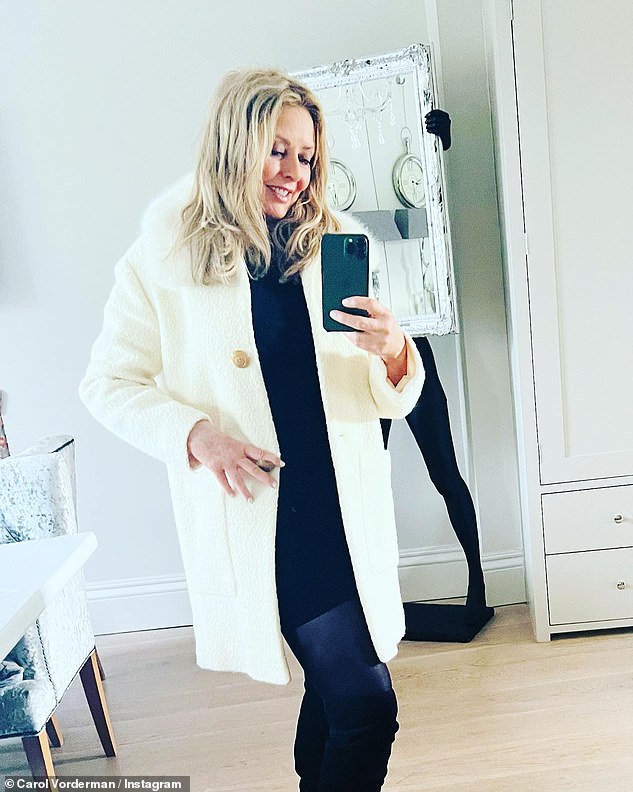 Carol Vorderman flaunts her fantastic physique before speaking on BBC Radio Wales in a form-fitting black dress and knee-high boots