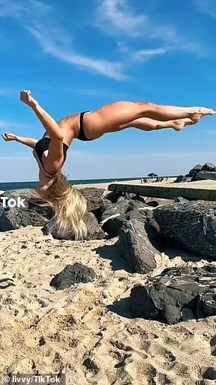 Olivia Dunne, 21, has topped 9 million TikTok views for a jaw-dropping gymnastics display on the beach, which also shows off her toned figure in a bikini.