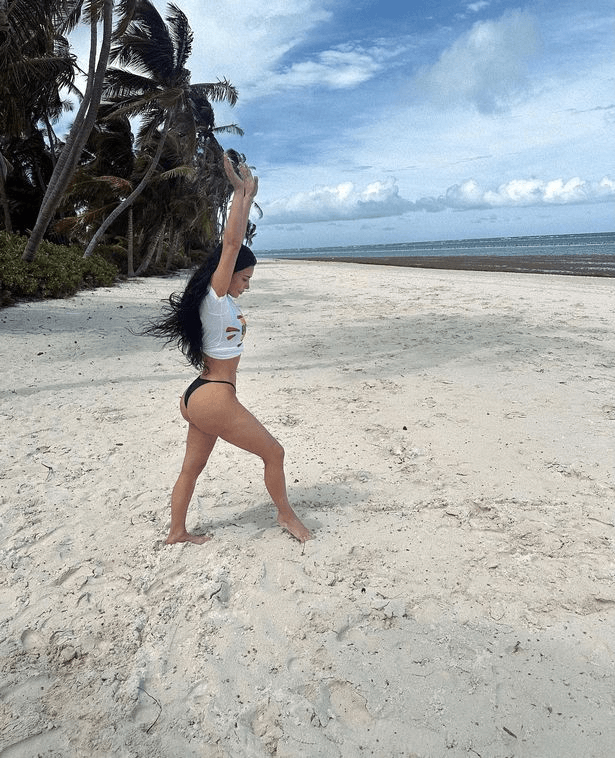 Cartwheel snaps reveal killer curves as Kim Kardashian wears thong bikini