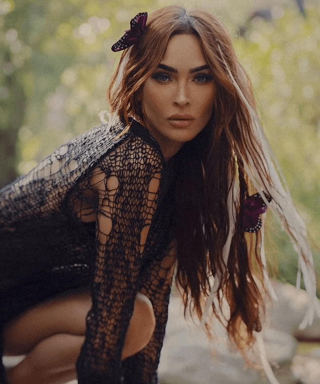 More forest snaps reveal Megan Fox's backside in a sheer mesh outfit
