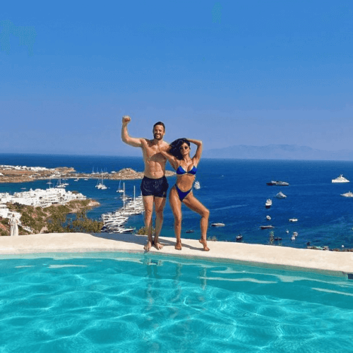 Nicole Scherzinger jumps into pool wearing tiny bikini as she's branded 'hottest woman alive'