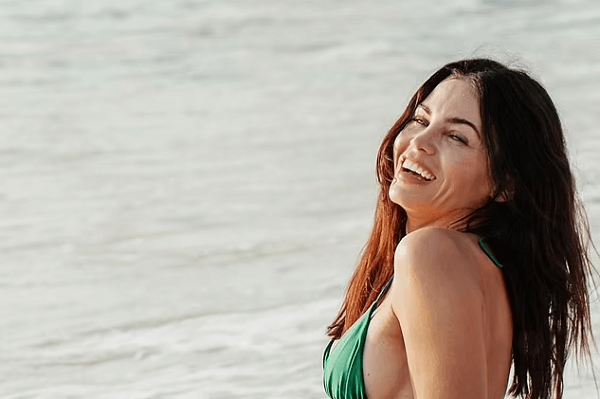 Jenna Dewan enjoys a beach day in a green string bikini while showing off her toned figure