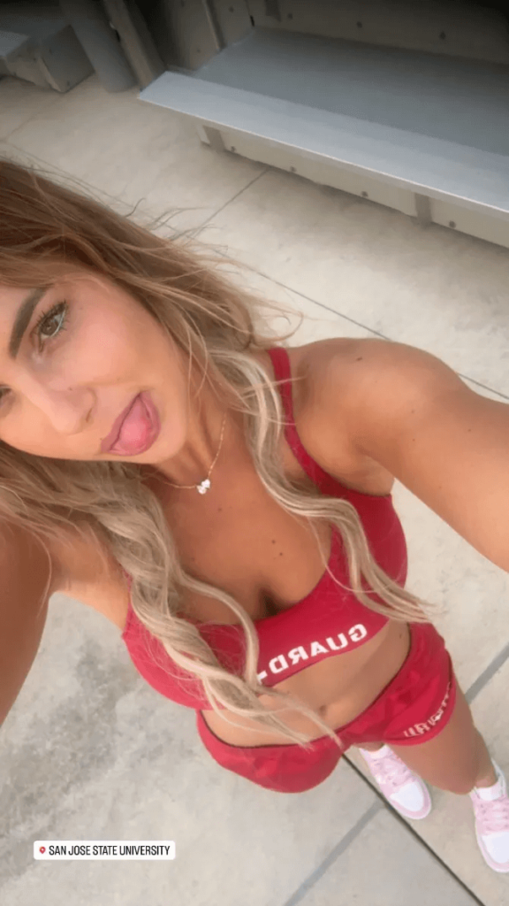 Wearing a red two-piece outfit, she posed next to the pool.