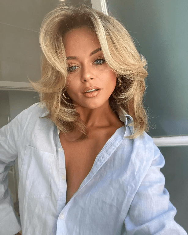 Former Celebrity Juice star Emily Atack stunned fans with her natural beauty while posing in a breezy blue linen shirt.