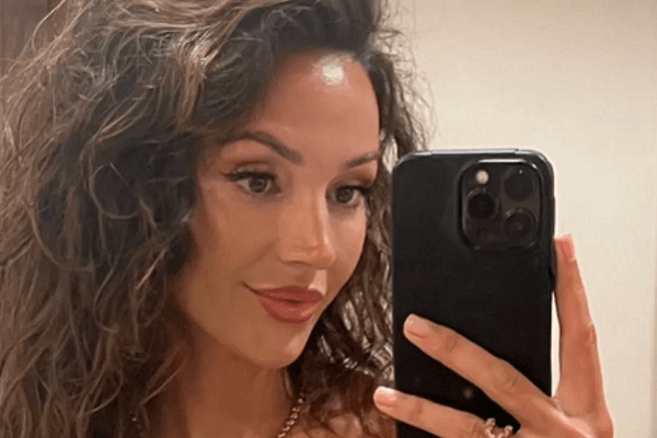The gorgeous Michelle Keegan sharing a mirror selfie in an extreme cut-out frock, showed plenty of sun-kissed skin