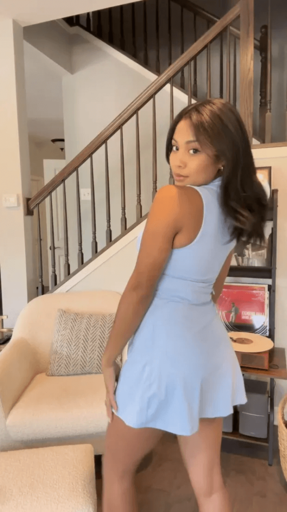 She posed in a series of different angles in a light blue golf dress with a dark blue sweater in her most recent post while preparing for her next outing on the links.