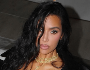In leather bra, Kim Kardashian displays curves in an eye-catching display