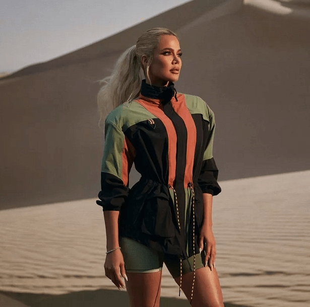 Khloe Kardashian has taken fans by storm with her latest snaps, displaying her abs in a tiny orange sports bra for her partnership with Fabletics.