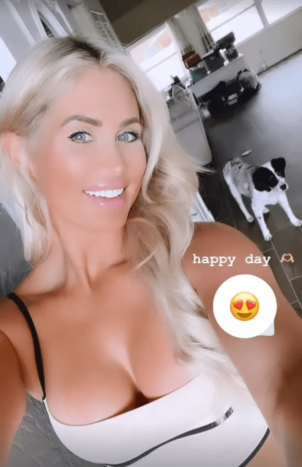 As her dog was in the background, Karin also wore no bra. She captioned the photo: "Happy Day."