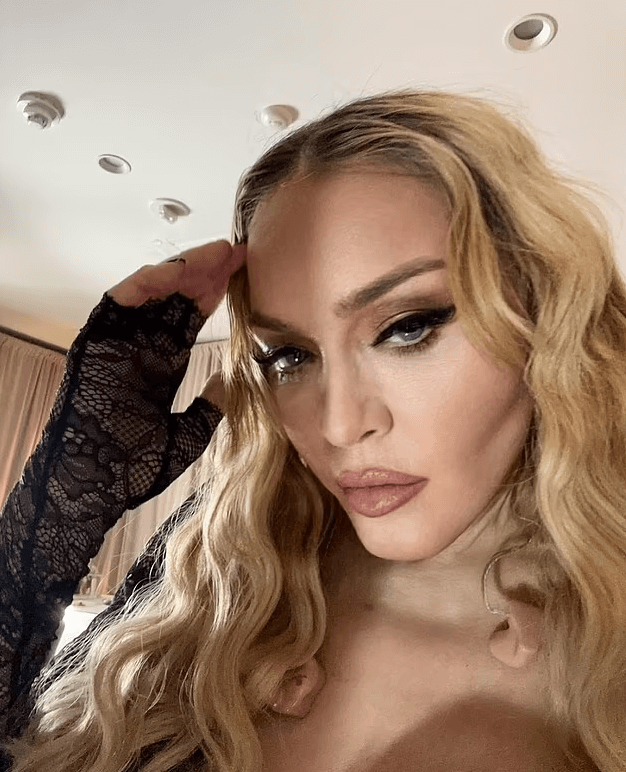A lace bra shows off Madonna's very youthful complexion