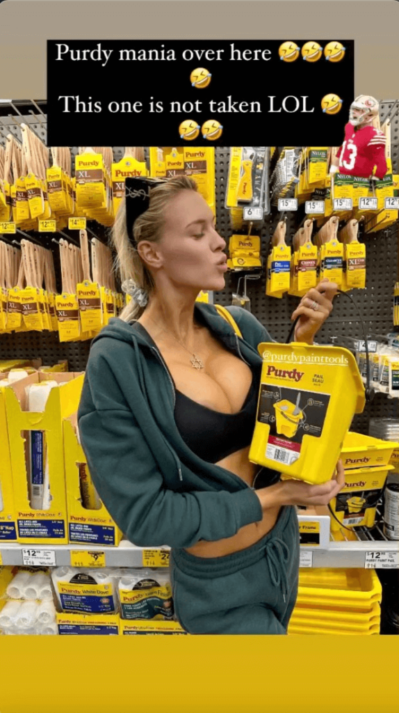After a lengthy summer vacation in Europe, Veronika returned to the US for some shopping and posed with Purdy paint tools she bought at a hardware store.