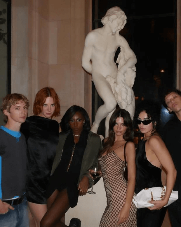 In a series of snaps Em shared on Monday, she appears with models and celebrities such as Charli XCX.