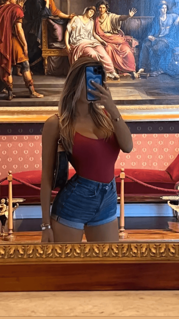 Ice hockey star Mikayla Demaiter exposes her seriously busty sides in red tank top with tiny denim shorts