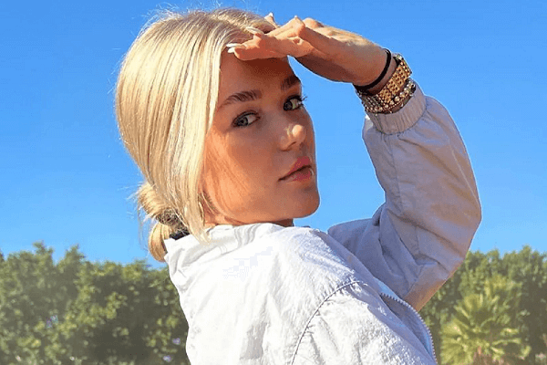 In a daring outfit, stunning Katie Sigmond rides a dirtbike to tease her fans to jump on