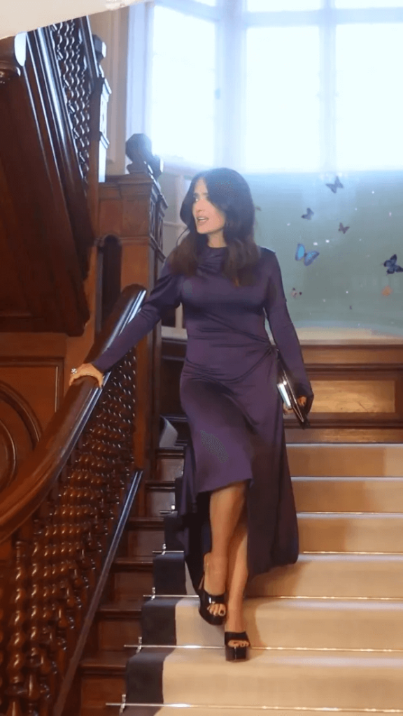 At one point, she was descending a set of stairs while looking in the distance while posing.