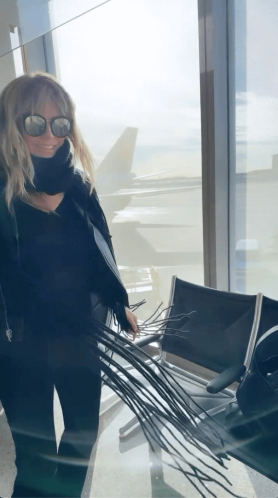 Heidi Klum posted a video to her Instagram account on Monday showing off her fit figure in skintight leggings at the airport.