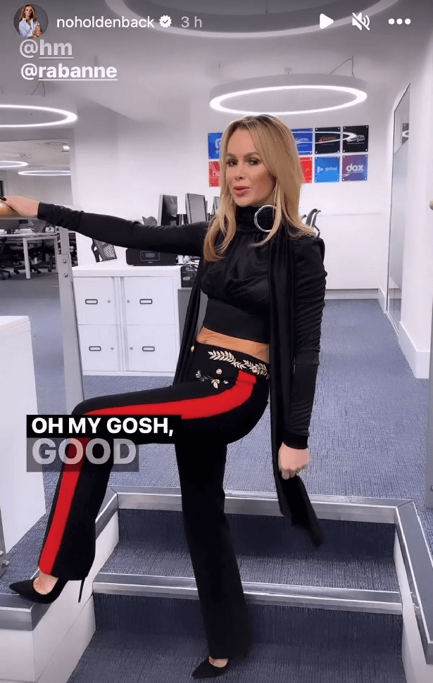 A stunning crop top showcases Amanda Holden's washboard abs as she steps out dressed for the holidays