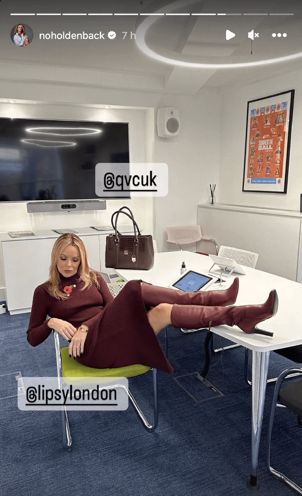 Amanda Holden made some jaws drop when she flashed her endless legs in a teeny dress and thigh-high leather boots while strutting around the Heart FM office.