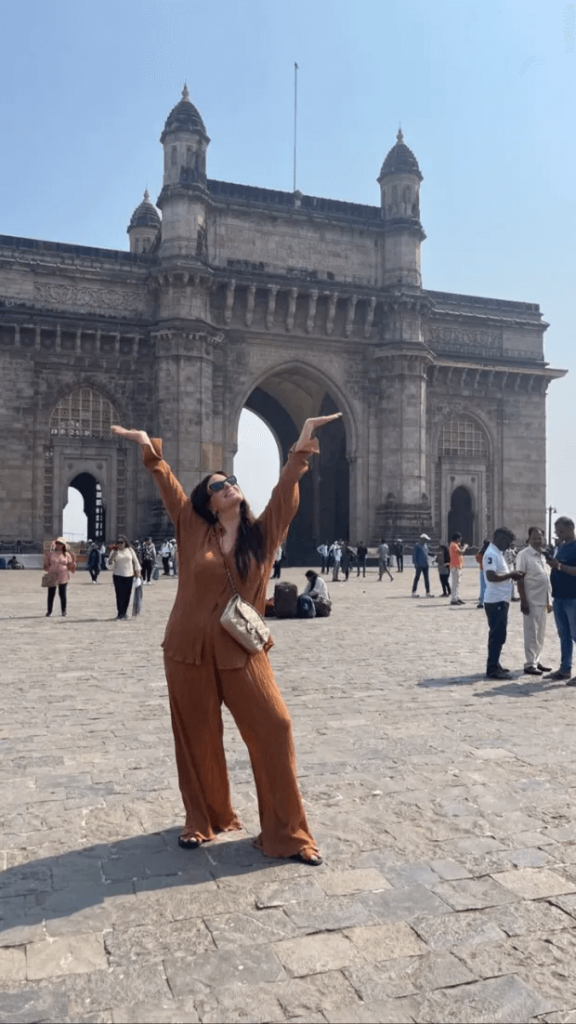 Ahead of her Spanish getaway, the star enjoyed his time in India, posing in front of a gigantic structure, raising her hands and smiling wide.