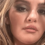 In a plunging black blazer, Selena Gomez flaunted major cleavage in a racy selfie