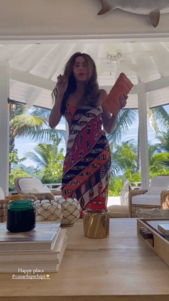 She quickly deleted an Instagram Story after fans noticed a man's voice could be heard in the background as she danced and jumped around in a plunging dress on Colombian getaway.