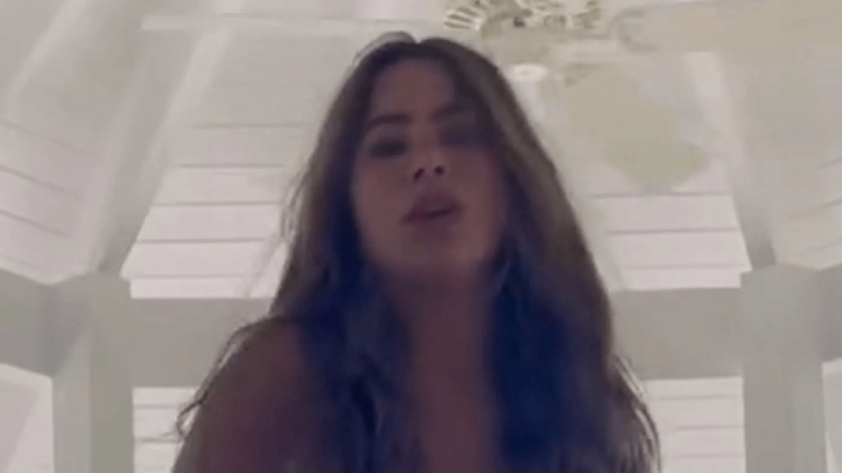 In a plunging dress, Sofia Vergara jumped around with a mystery man on her Colombian getaway