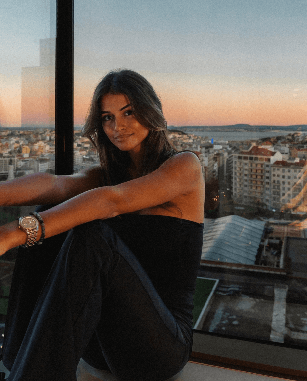 Luisinha Oliveira is described as 'the definition of beauty' in her latest post as she shows off curves in Lisbon