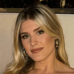 A tiny mini-skirt and crop top show off Eugenie Bouchard’s toned figure as fans declare: “You are art.”