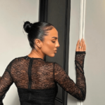 In a totally see-through lace bodysuit, Coronation Street star Arianna Ajtar shows off her bum without a bra