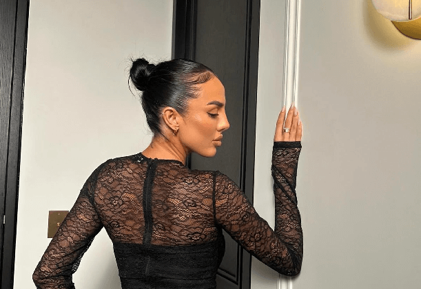 In an absolutely see-through lace bodysuit, Arianna Ajtar showing off her killer figure without a bra