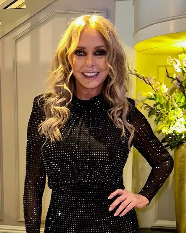 In Her Latest Sizzling Display Carol Vorderman Flashes A Bra Beneath A