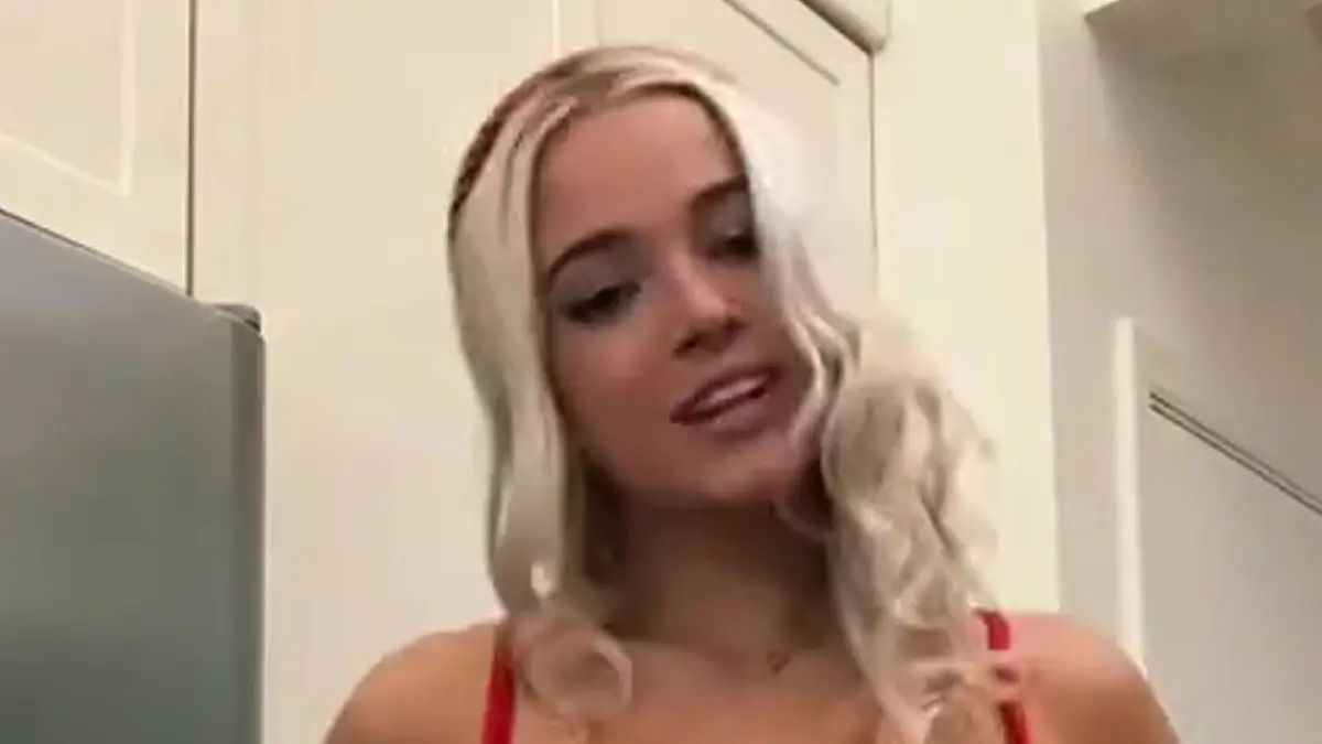 Olivia Dunne stunned her fans with a figure-hugging red dress and long white socks during a daring TikTok video