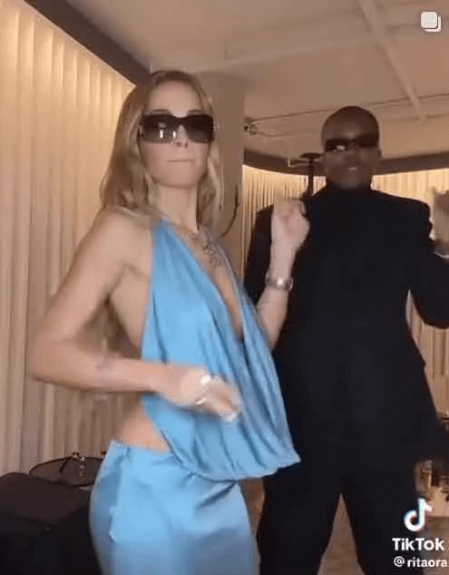 Rita Ora exposes all in plunging halterneck dress that hits at midriff