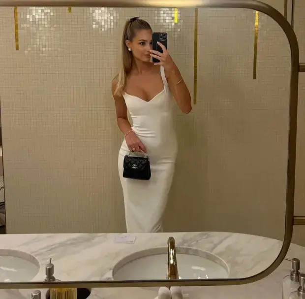 Viktoria Varga stuns fans in her white dress as she delivers the ultimate Christmas outfit