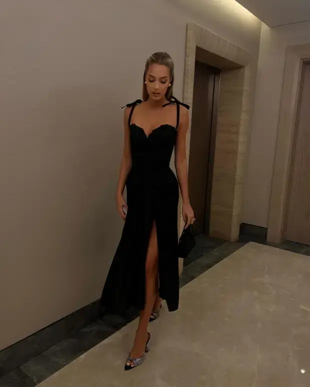 ‘World’s hottest woman’ Viktoria Varga shines in a  figure-hugging black dress and high heels as her fans thank her for existing