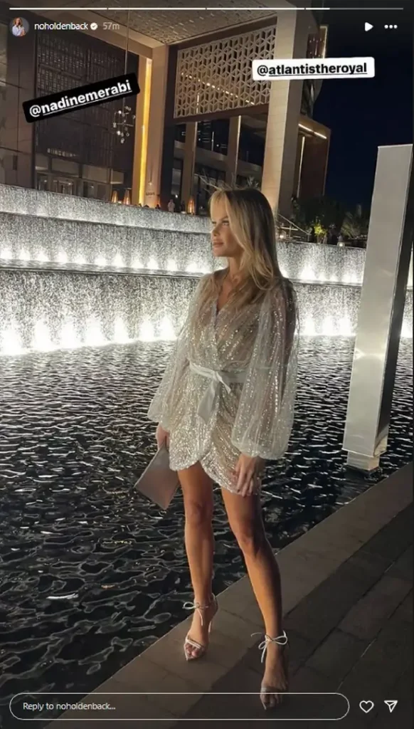 Amanda also shared a photograph of her stunning outfit by the water, revealing the full extent of her stunning ensemble.