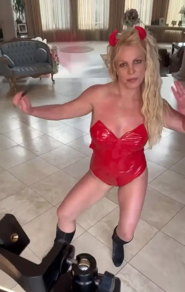 Fans were flustered watching Britney Spears dance around in a strapless latex bodysuit and Devil horns.