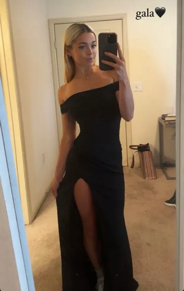 Olivia Dunne looks stunning when she goes braless in a black slinky dress for a gala