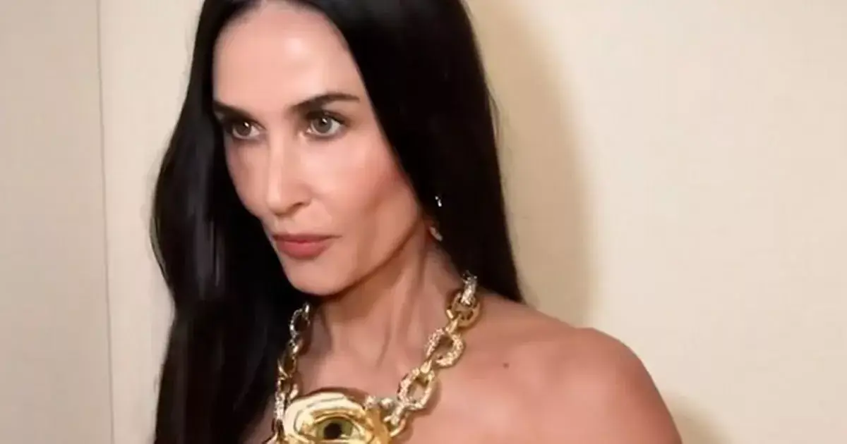 When she posed for Interview magazine, Demi Moore wore blue underwear over a sheer halter dress and sat on her knees on a bed