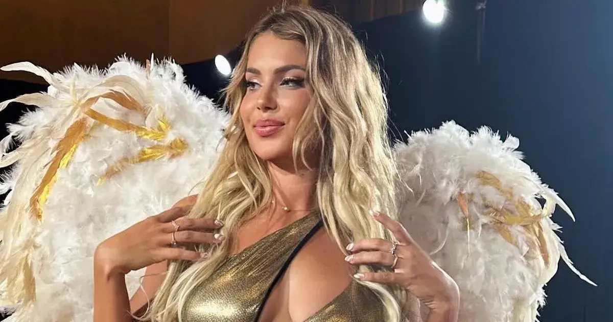 A gold-strappy bikini drew swoons from fans as Andreea Dragoi was called a “Goddess” A gold-strappy bikini drew swoons from fans as Andreea Dragoi was called a “Goddess”