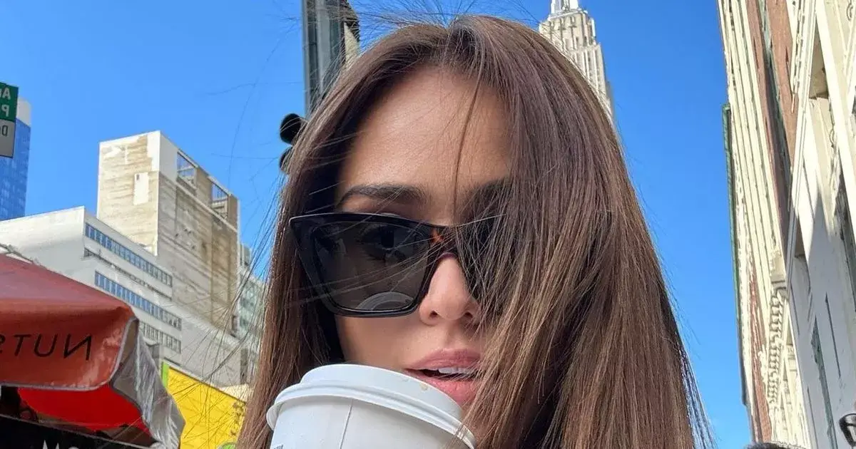As she posed on her bed, Yanet Garcia bared all in a bodysuit with extreme cut-outs