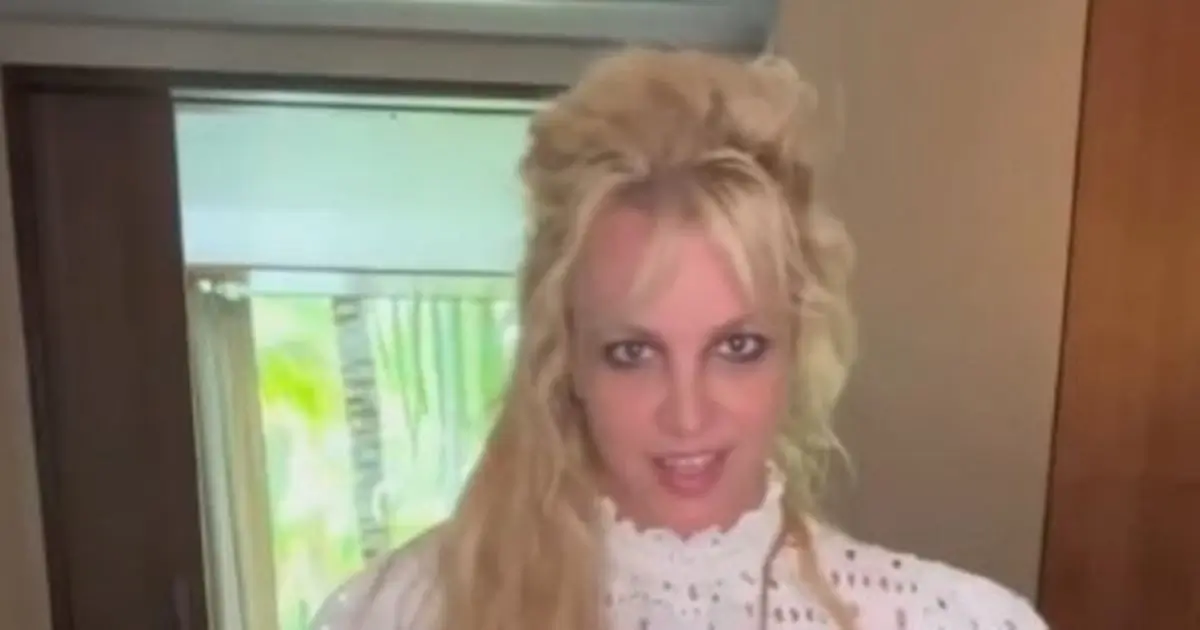 Britney Spears wore tiny pink shorts and a white see-through crop top, showing off her figure in a racy outfit