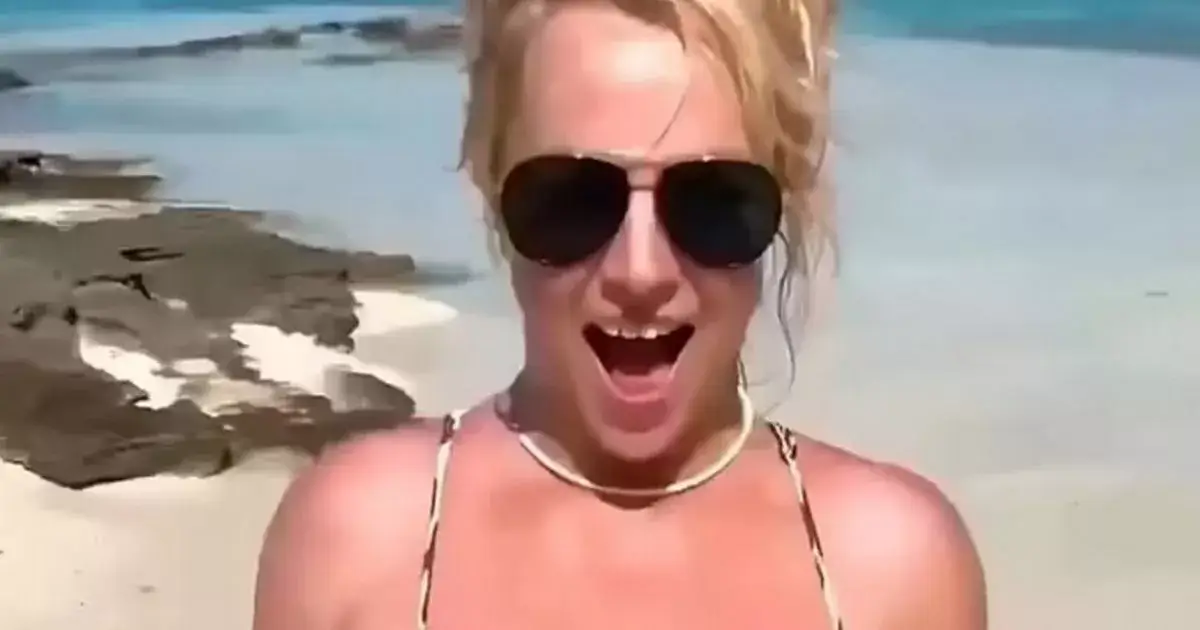 During daring beach display, Britney Spears teases fans with a tiny leopard-print bikini showing off her boobs