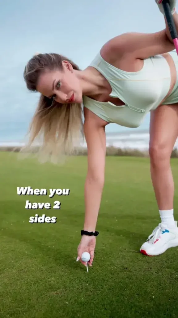 Paige Spiranac goes braless in a tight-fitted golf outfit as she puts a ball on the tee