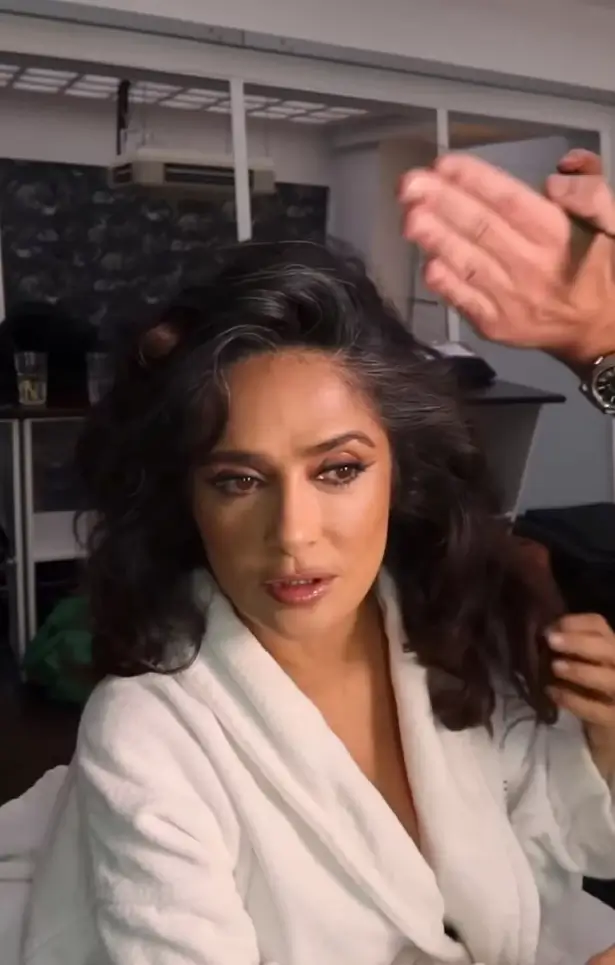 When Salma Hayek shared a series of hair care tips with fans online, she was labeled the "most beautiful woman in the world" for her effortless style in an open robe.