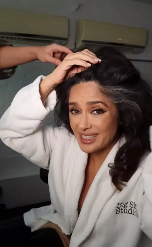 Salma Hayek is called "the most beautiful woman in the world" after stripping off under an open robe for a glow-up