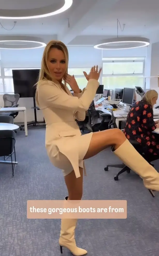 Amanda, 53, posted a photo of herself walking across the office wearing a plunging white dress with a mini-skirt that showed off her cleavage on Instagram.